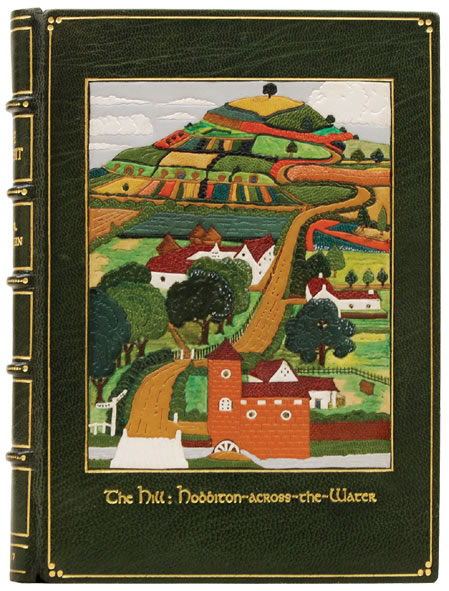 On the front the onlay imitates the scene of the frontispiece: Hobbiton-across-the-Water.